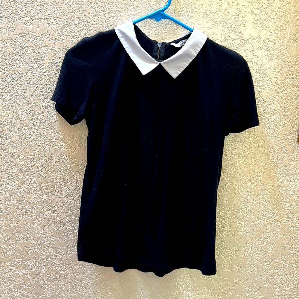 Vintage white collared short sleeved top.